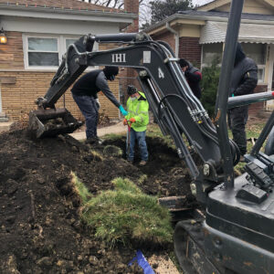 Sewer Line Repairing by JCB
