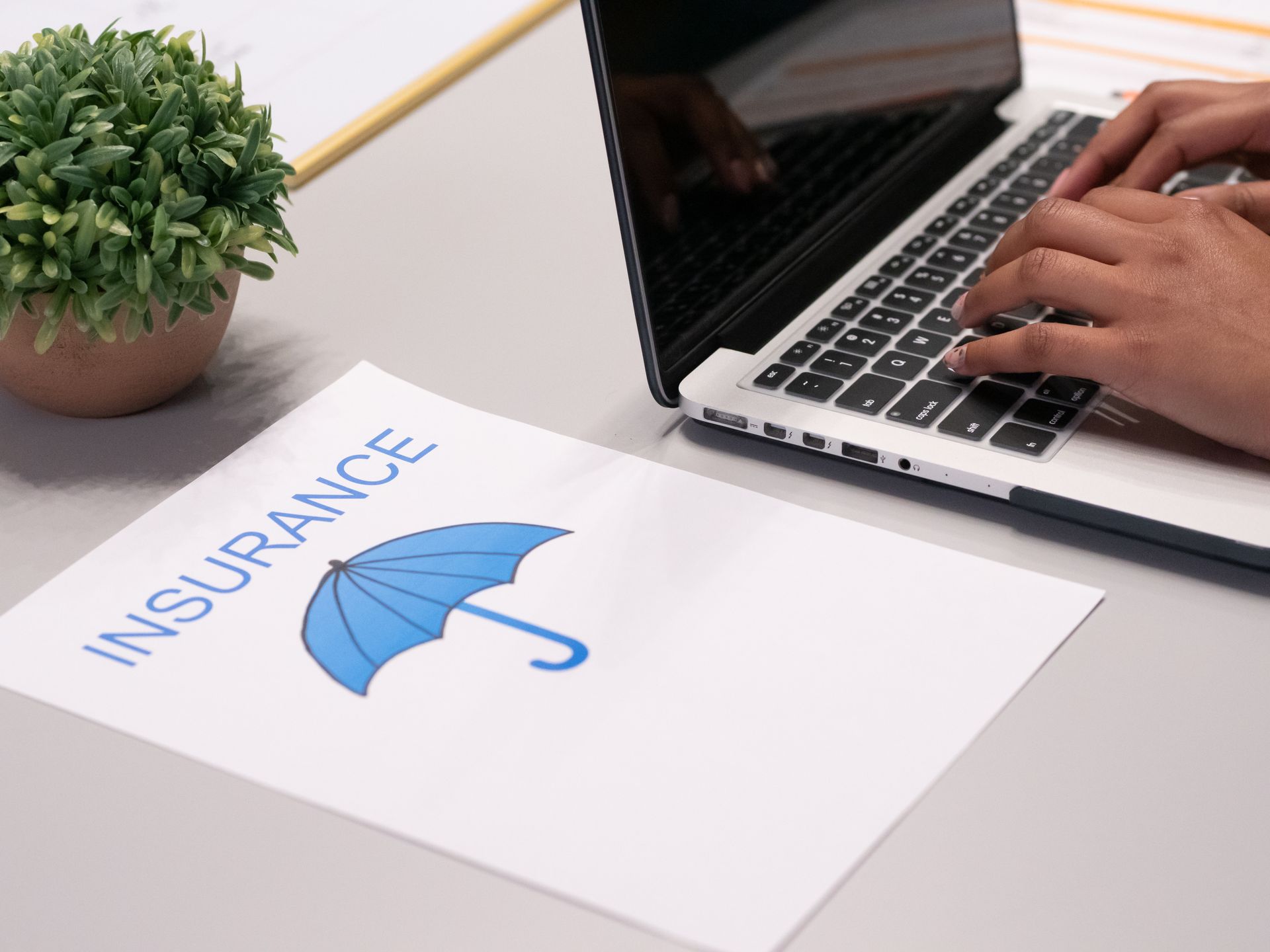 A woman looking into homeowners insurance for sewer line repair in Chicago
